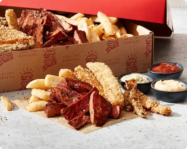 A mix of our Famous Grill’d Chips, Sweet Potato Chips and Zucchini Chips in a catering share pack