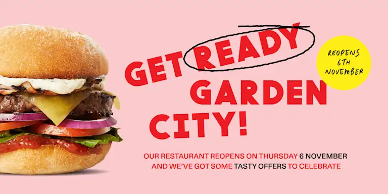 Garden city reopening banner