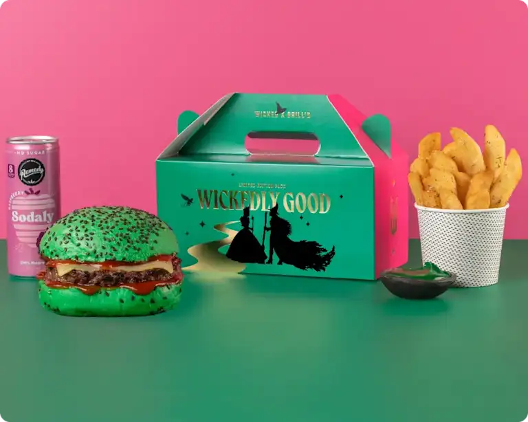 Grill'd wicked kids pack, including a kids beef burger on a green bun, chips, drink, and a limited edition Wicked themed box.