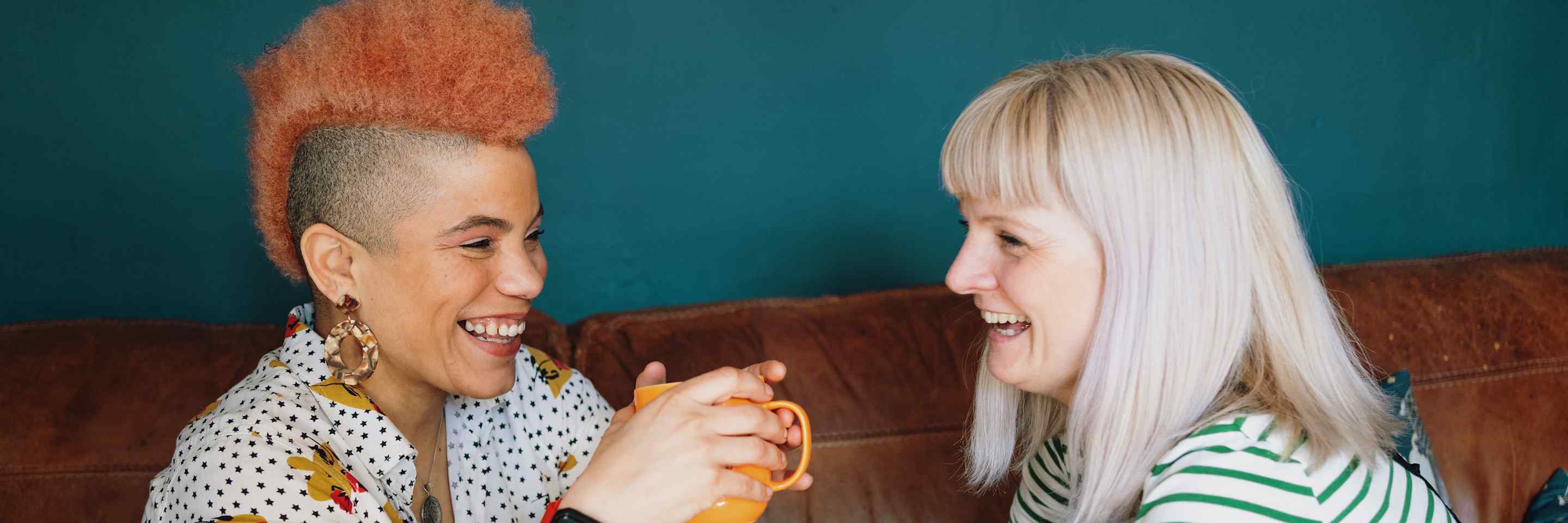 Two friends having coffee