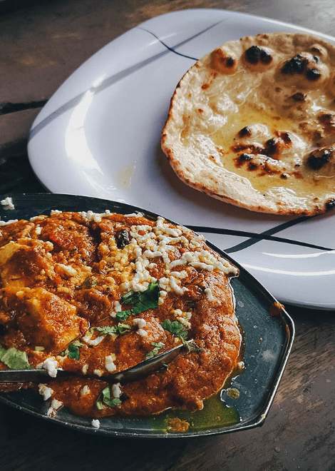 Try the best paneer curry and fresh buttery naans at this no name eatery