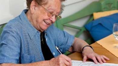 Older person writing