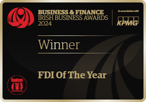 Black background with gold font that reads: 'Business & Finance Irish Business Awards 2024. In association with KPMG. Winner. FDI Of the Year.' Red motifs are on the left of the certificate.