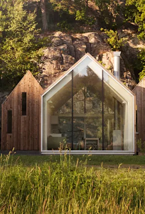 This Nordic Cabin Cluster Finds Balance in Private and Social Spaces