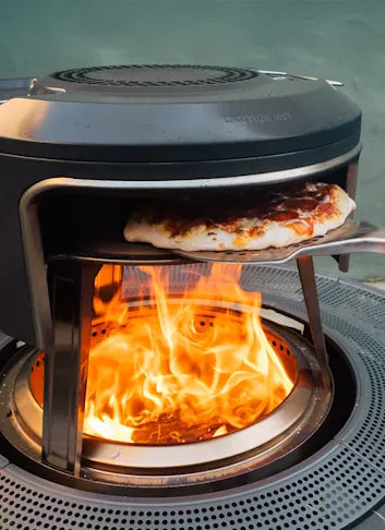 Solo Stove Pi Fire Review: Turn Your Backyard Fire Pit Into a Pizza Oven