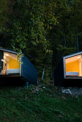 Prefab Cabins Designed to Embrace Nature Near Lake Bled