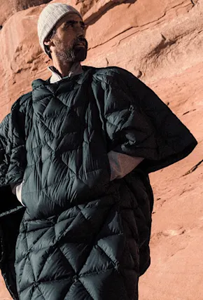The AETHER Down Poncho Is a Perfect Campsite Companion