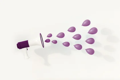 purple and white megaphone with purple balloons soundwaves