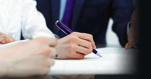 Team of financial inspectors create report calculating checking balance