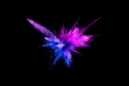 Explosion-of-coloured-powder-isolated-on-black-background