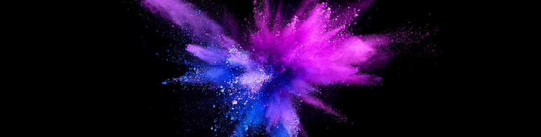 Explosion-of-coloured-powder-isolated-on-black-background