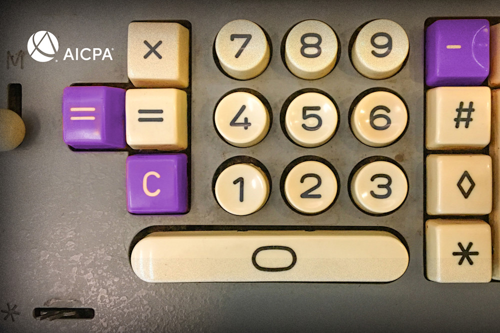 close up of buttons on an old calculator