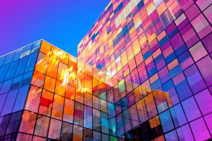 External view of office building with windows reflecting light