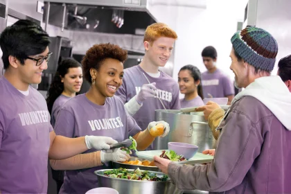 Group volunteering by serving food