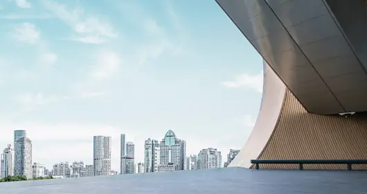 under-bridge view of city skyline