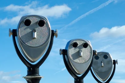 Four Long range binoculars in a row