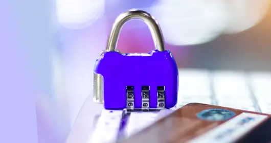 photo of credit card and purple padlock