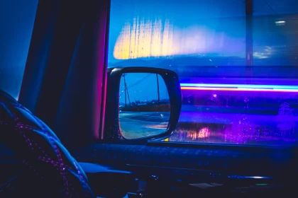 View of light trails seen through a car window