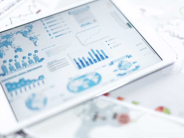 An image of graphs and charts on a tablet