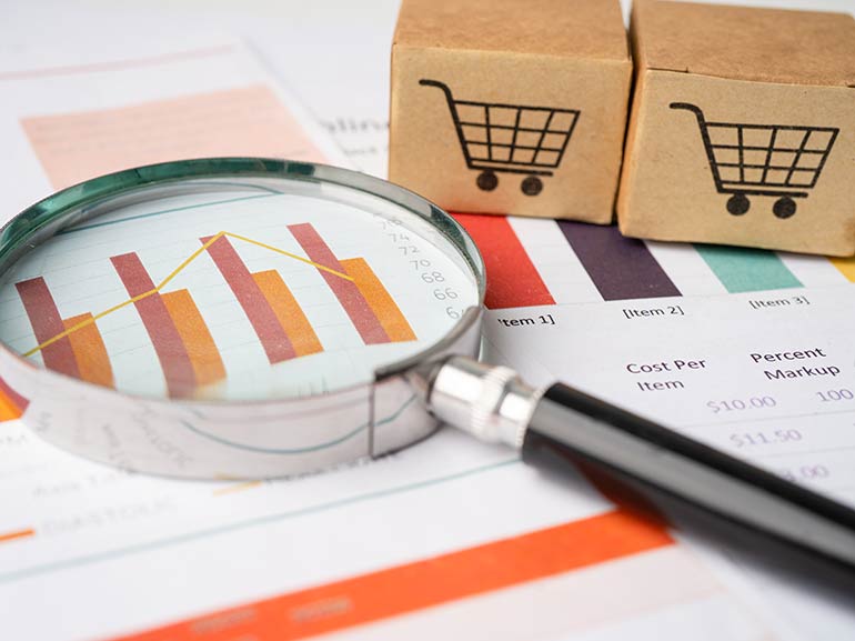 Magnifying glass on CPI charts papers