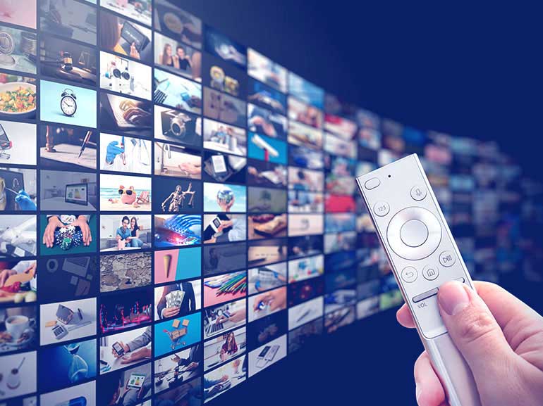 An image of a person changing the channels on an entertainment app