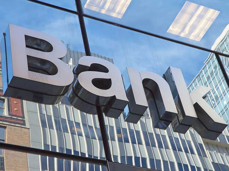 An Image of a Building with a Bank Sign Engraved On It