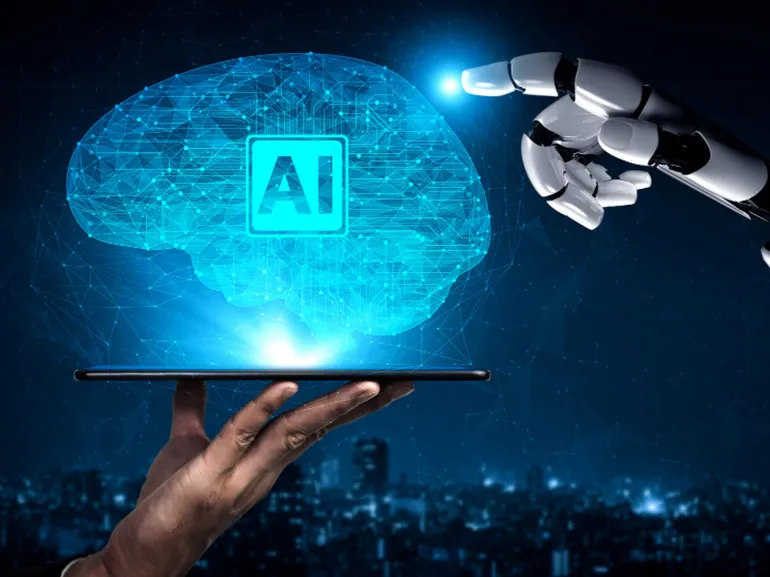 Artificial inteligence hollogram projected from a tablet and a robot hand