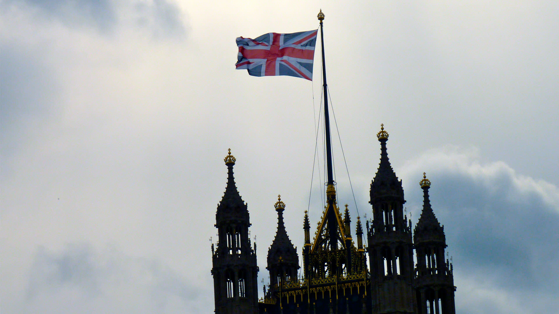 The Union Jack flying atop the Victoria Tower of the UK Houses of Parliament.