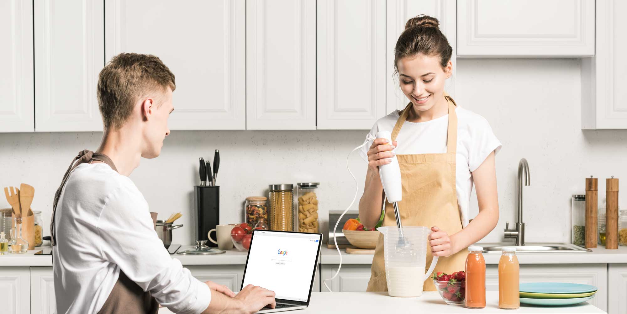 people-making-meal-with-laptop