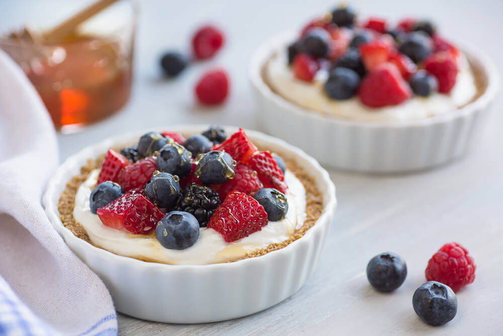 Yogurt and berry breakfast tarts with granola