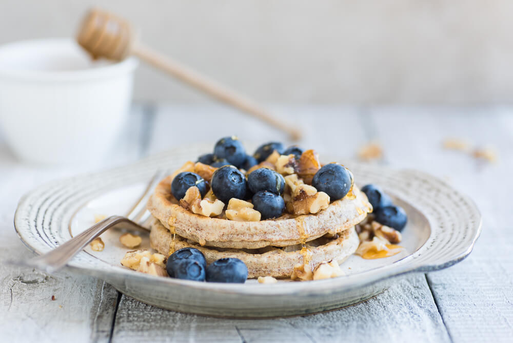 Whole wheat waffles with blueberries and walnuts