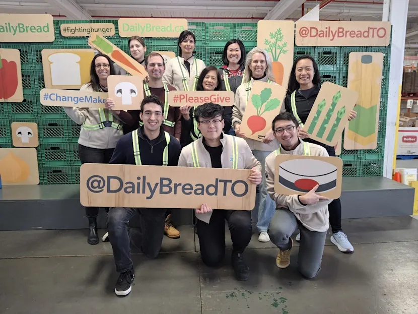 A group of people holding various signs