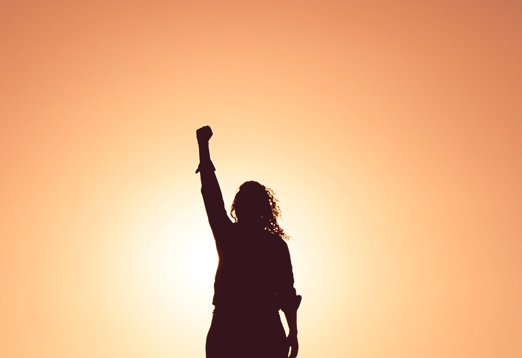 Shadow of a girl punching the air
