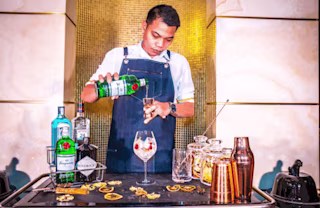 Bartender making cocktails thumbnail