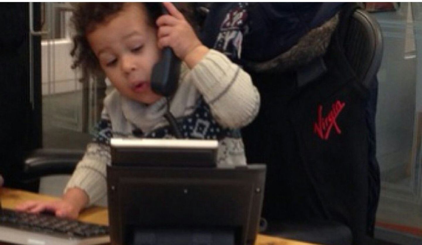 A child answering the phone at the London office