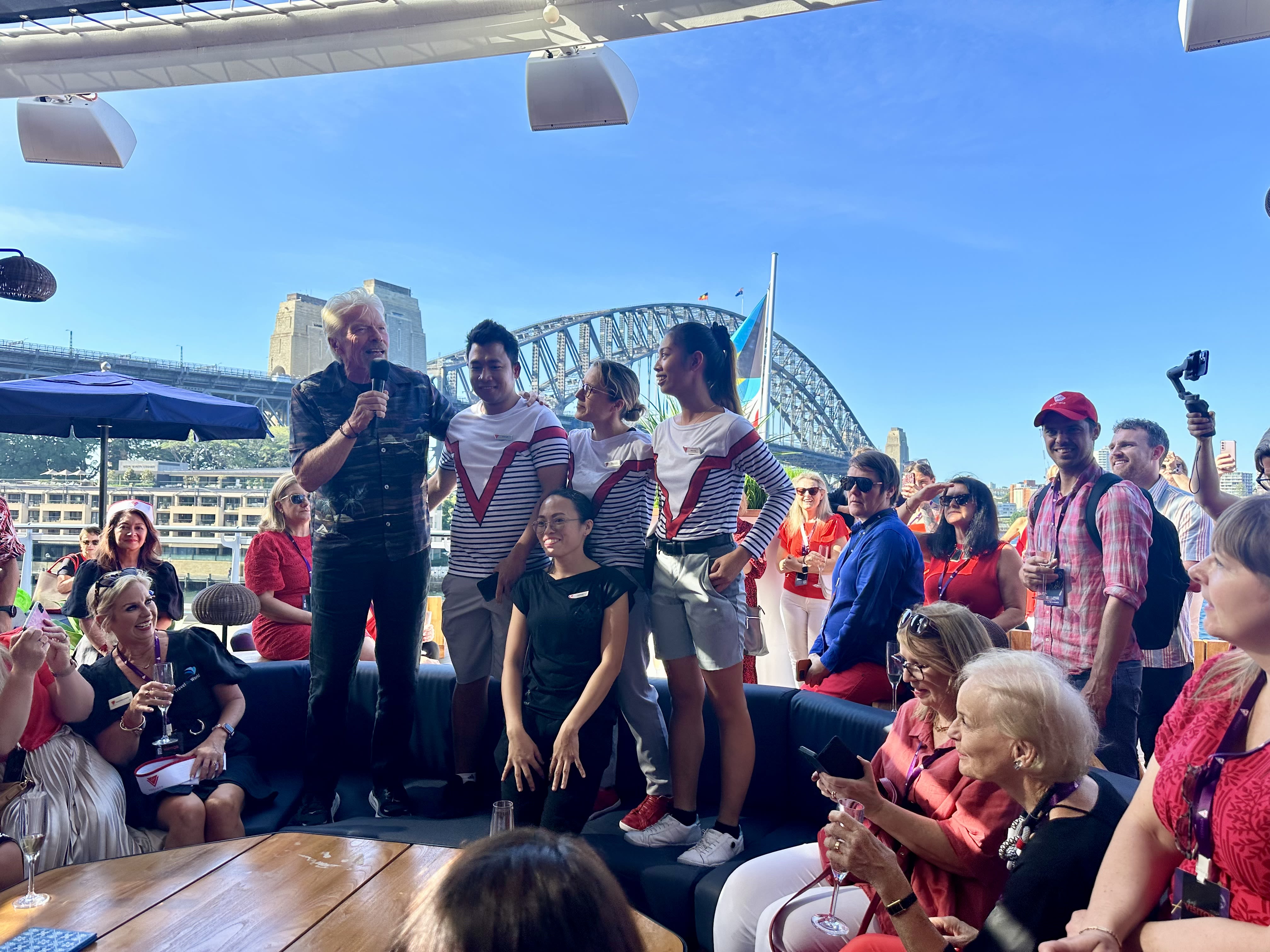 Richard Branson with Virgin Voyages crew in Sydney