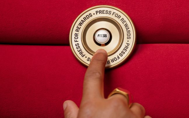 Image of man lingering over Press for Rewards button Image of man lingering over Press for Rewards button