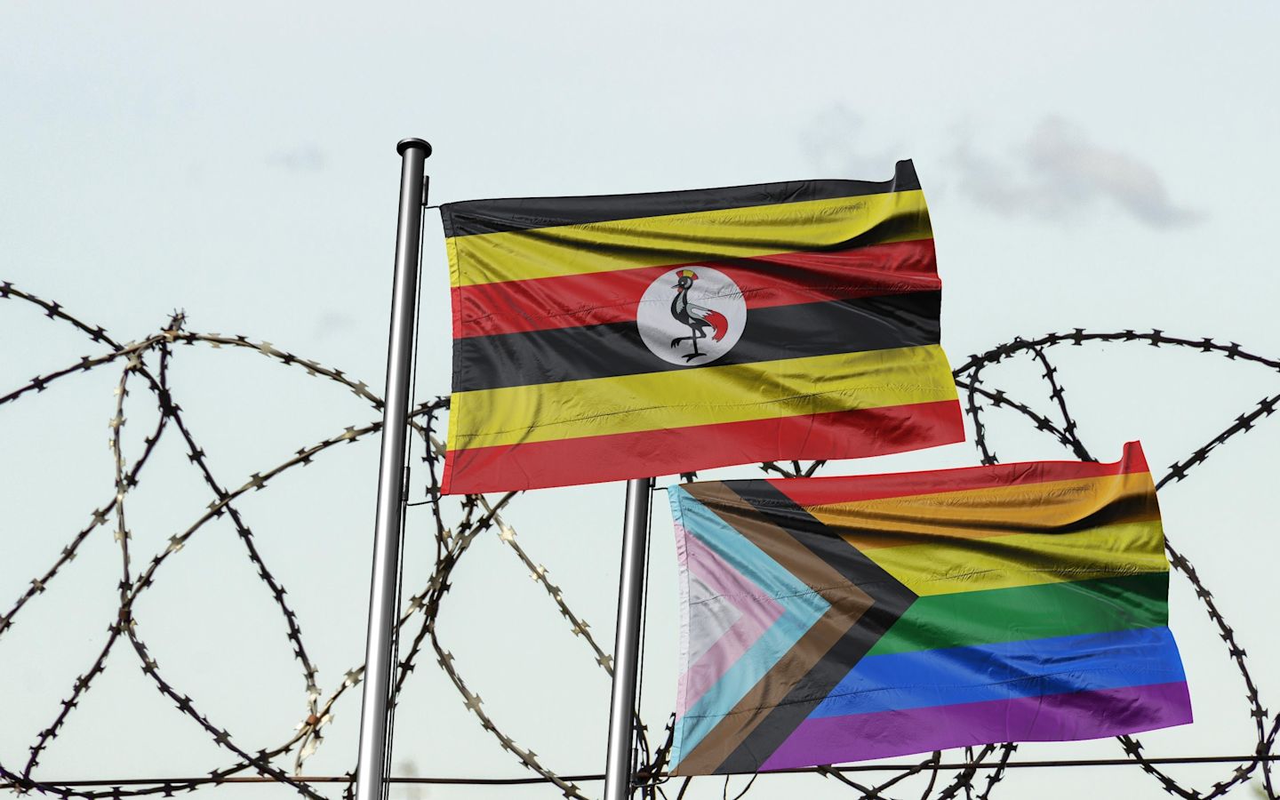 The flag of Uganda and a Pride flag