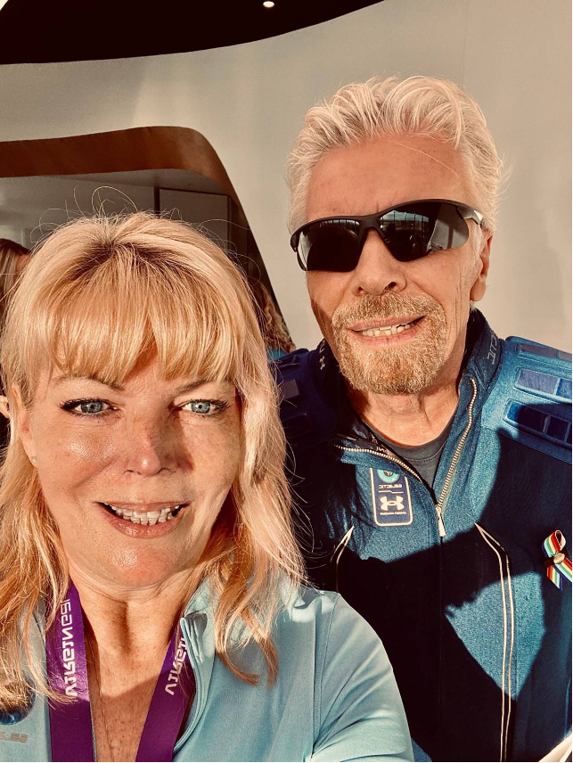 Karen Sparrow and Virgin Branson smiling ahead of Virgin Galactic's Unity 22 Space Mission