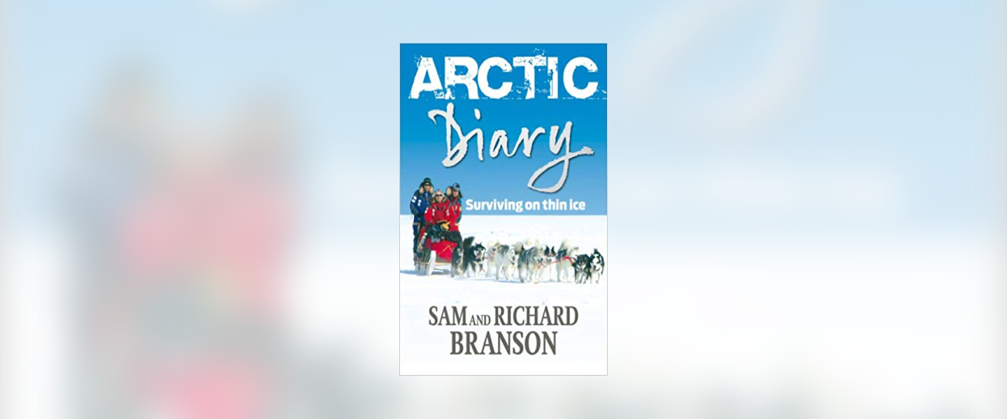 Front cover of the book Arctic Diary, with Sam and Richard Branson in the snow with a pack of husky dogs in front of them