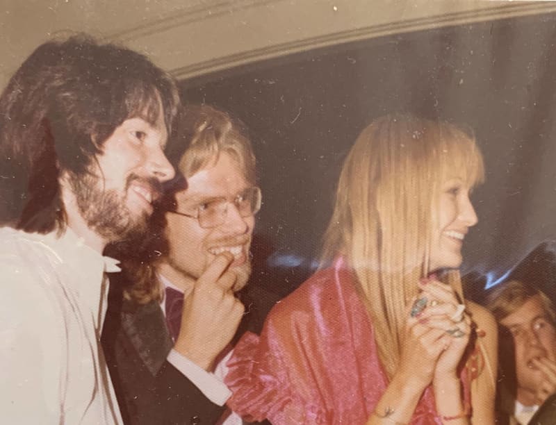 A young Richard Branson alongside Nik Powell and a woman with blonde hair