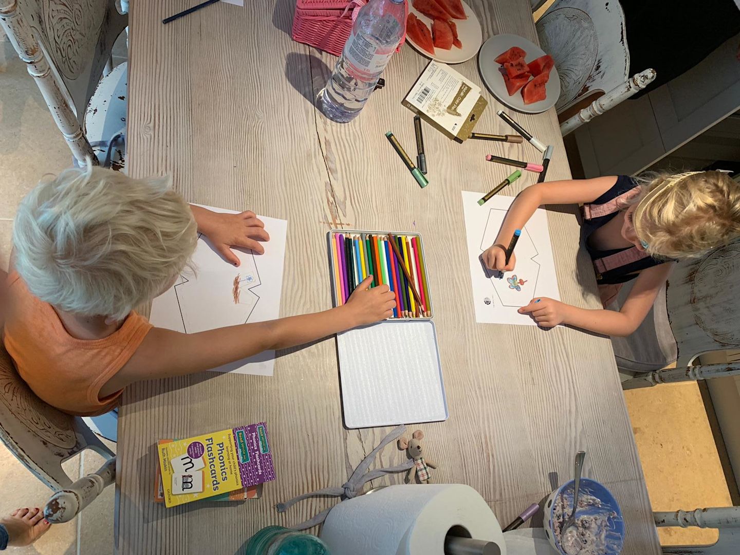 Etta and Artie branson draw face masks designs for The Skill Mill