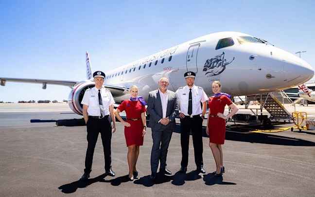 Virgin Australia crew with the new Embraer E190-E2 aircraft Virgin Australia crew with the new Embraer E190-E2 aircraft