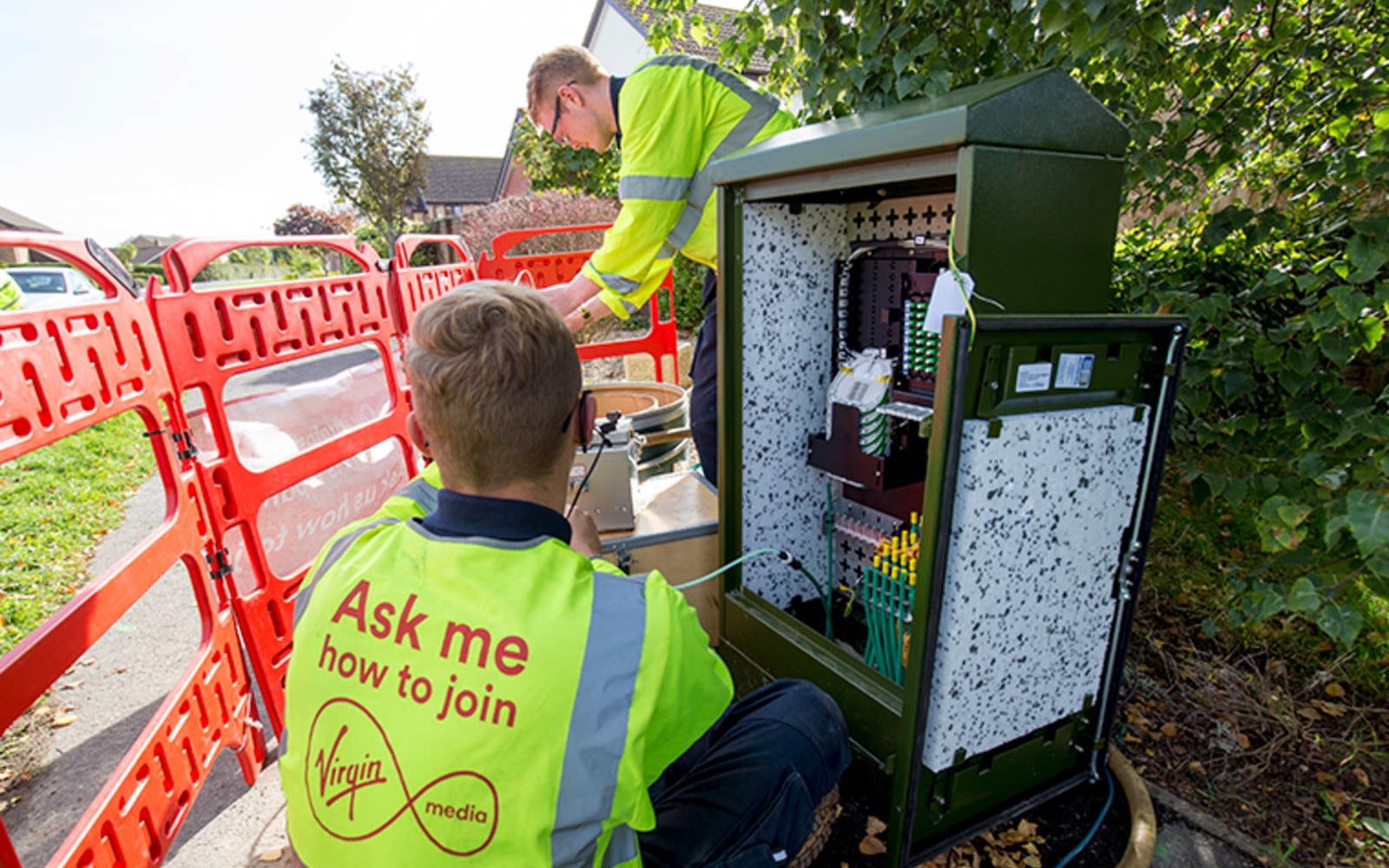 A Virgin Media engineer connects a broadband connection at an exchange point