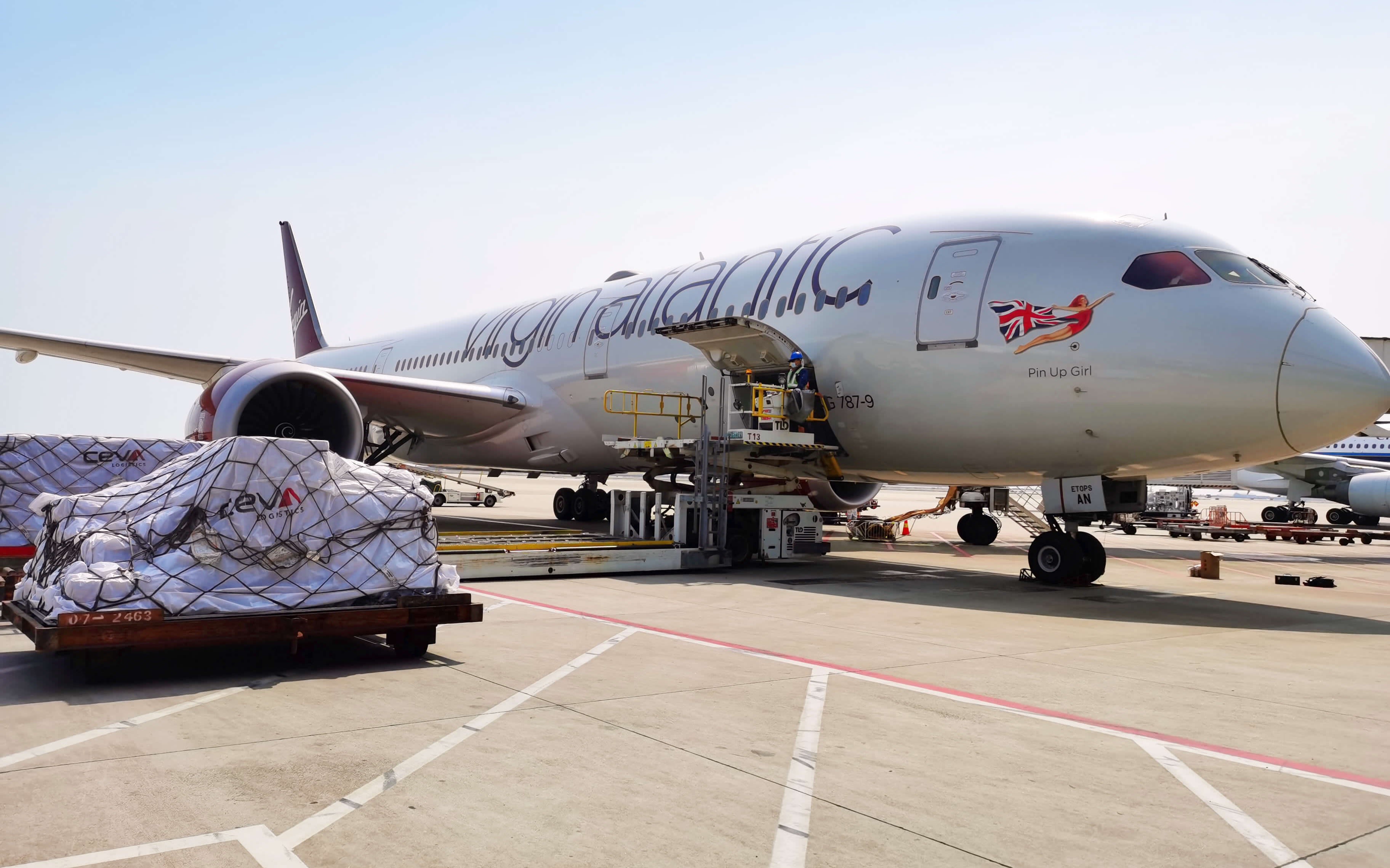 Medical supplies are loaded onto a Virgin Atlantic plane for a cargo flight