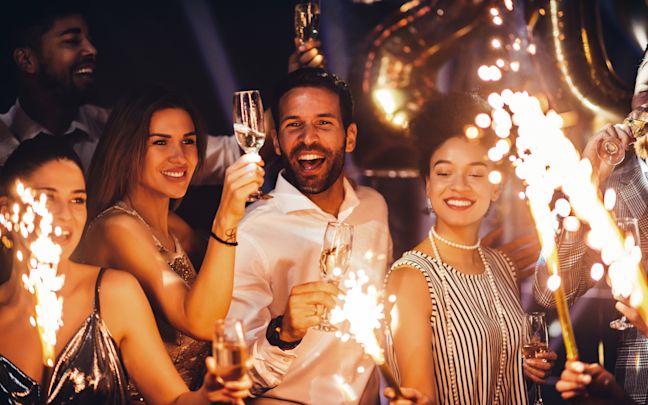 A group of friends at a New Year's party A group of friends at a New Year's party