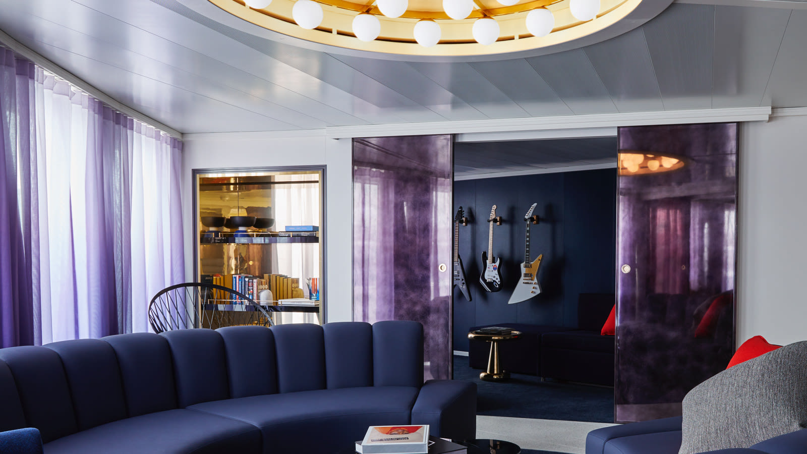 Living room area in one of Virgin Voyages' suites