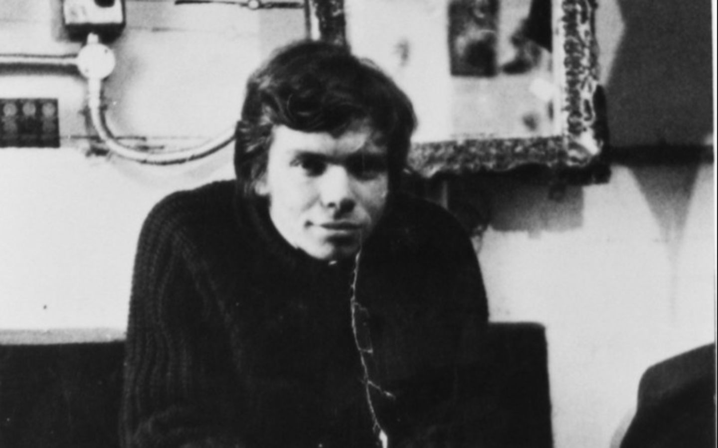 A young Richard Branson holds a tape recorder for his interview with James Baldwin