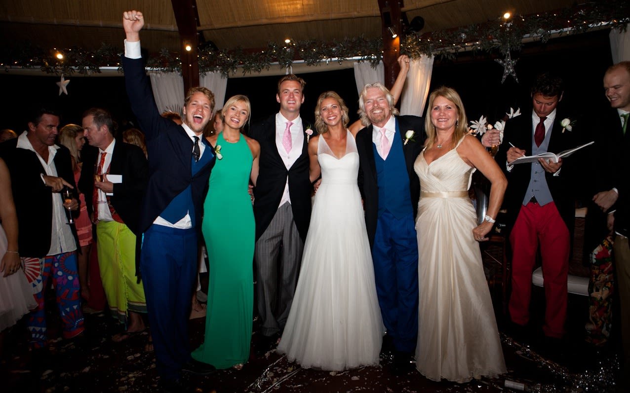 Holly Branson and Freddie Andrewes pose for the camera at their wedding alongside Sam Branson, Bellie Branson, Richard Branson and his wife Joan