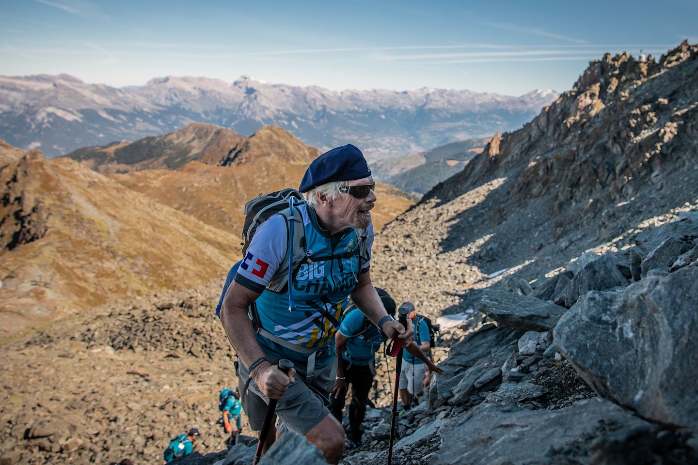 Richard Branson hiking a mountain on the 2019 Strive Challenge